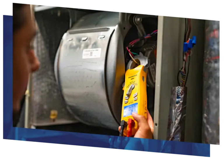 HVAC technician using a multimeter to diagnose an air handler or furnace.